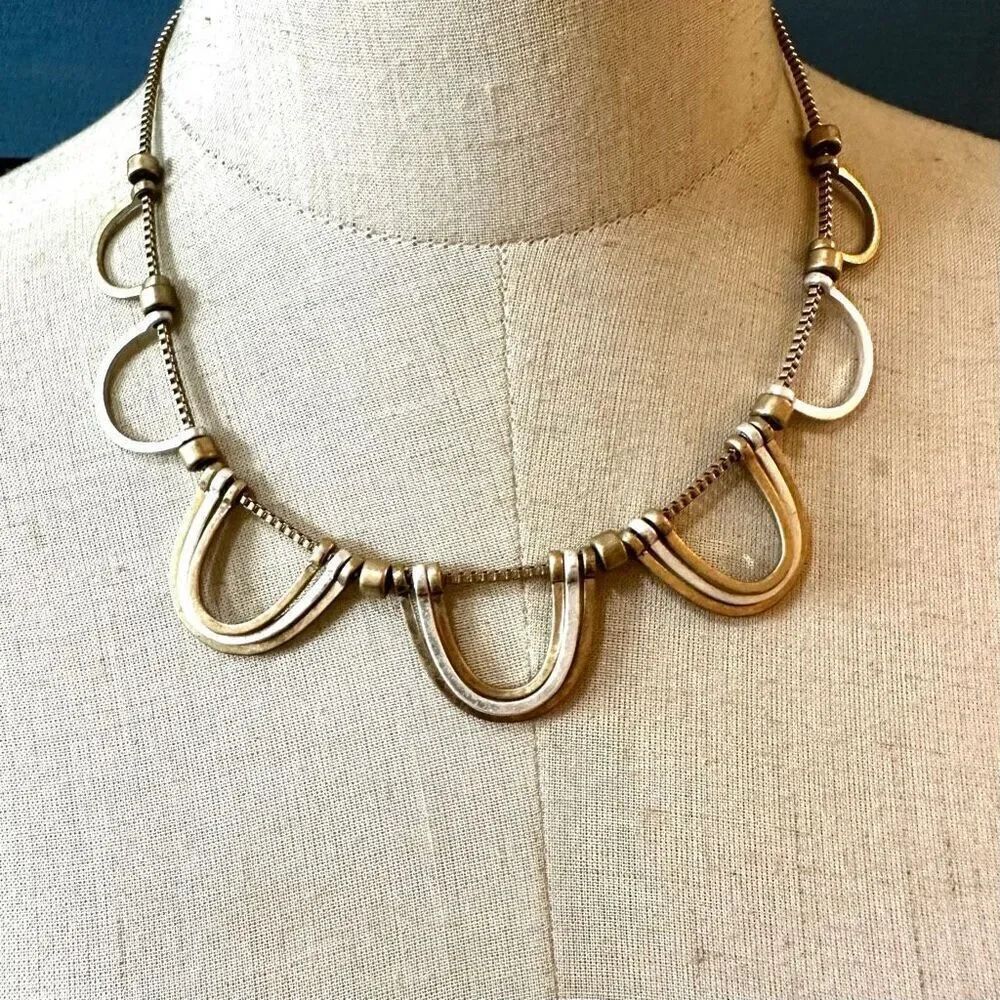 Silver and gold tone half circle necklace